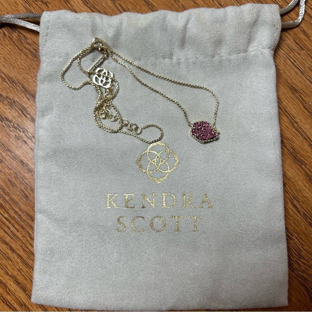 Kendra Scott necklace with pick stone
